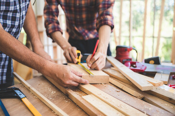 professional carpenters woodworking teamwork together creatively, creative carpenter working...