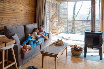 Happy couple enjoying time together in living room