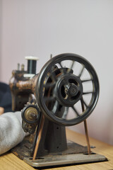 Close-up of a vintage hand sewing machine. Selective focus.