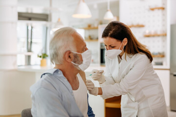 White protective masks, treatment at the doctor office.