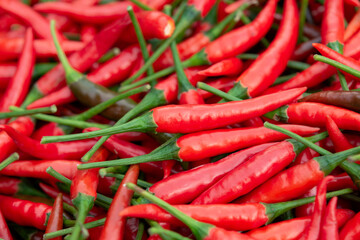 Fresh red chili pepper background.