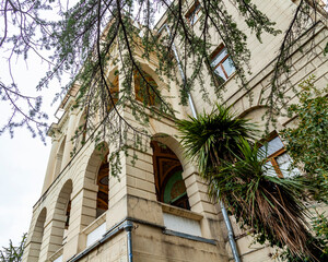 Sochi, Russia, April 13, 2021. Fragment of the facade of the main building of the abandoned...
