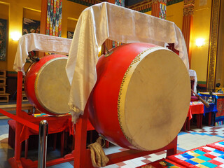 large ritual drums in the interior of a Buddhist temple.
