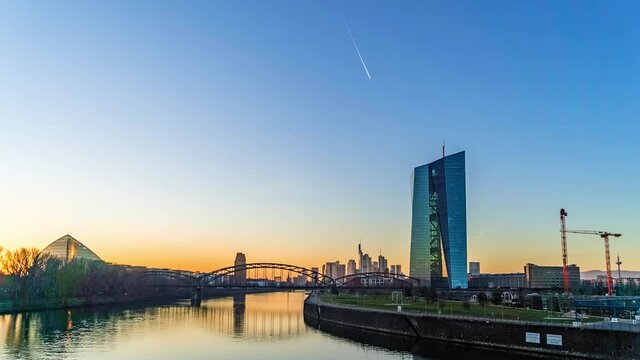 The day to night time lapse of the European Central Bank and the surrounding environment in Frankfurt, Germany