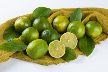 Ripe green lemon fruit on white background