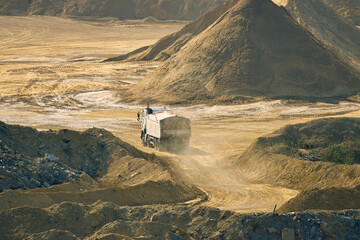 A Tipper Truck working in a Huge Quarry. England, UK.