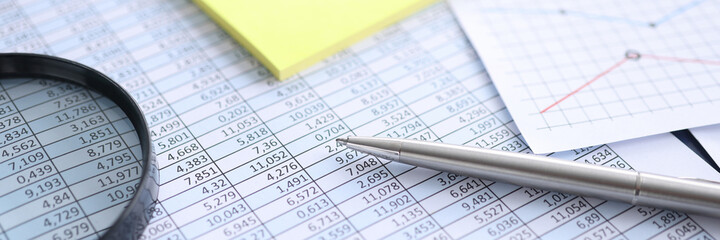 Papers with digital indicators magnifier and pen