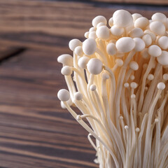 Fresh Enoki mushrooms  with selected focus.Enoki, also known as velvet shank, is a species of edible mushroom in the family Physalacriaceae.