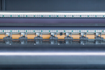 Closeup detail view of a plotter printer