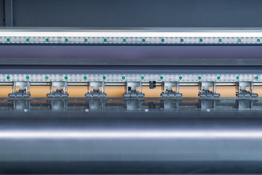 Closeup detail view of a plotter printer