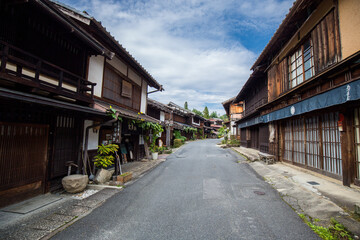 Old Japanese post town of Tsumago. Japanese tourist landmark village. Historic restored village on the Nakasendo trail in the Kiso Valley, Japan.