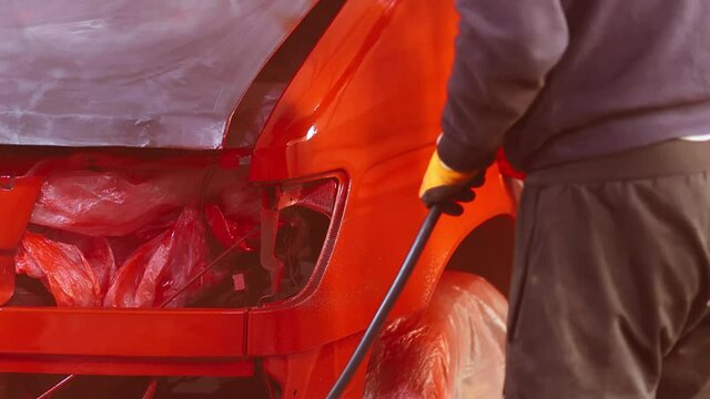 painting a truck in red, car body repair.