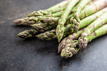 Fresh raw uncooked green asparagus.