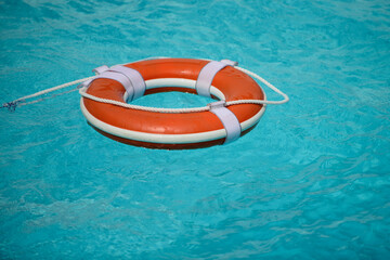 Water rescue emergency equipment. Rescue ring. Life buoy in swimming pool.