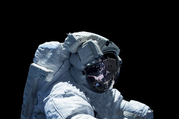 Astronaut in a spacesuit isolated on a black background. Elements of this image were furnished by...