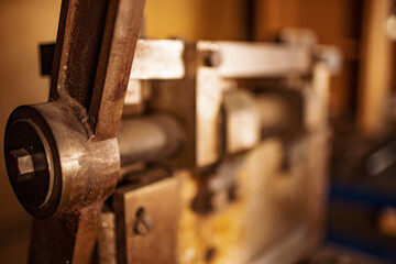 Guillotine machine close-up rusty metal massive parts