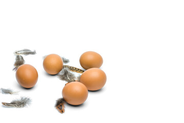 Brown chicken eggs and boils isolated on a white background