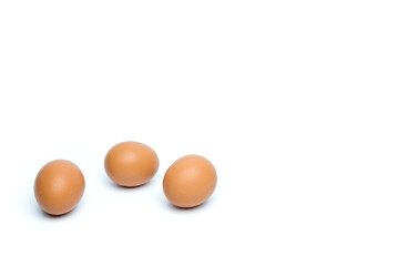 Brown chicken eggs are isolated on a white background