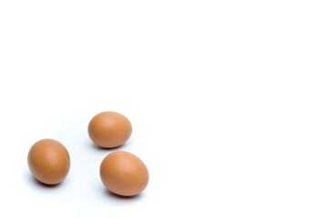 Brown chicken eggs are isolated on a white background