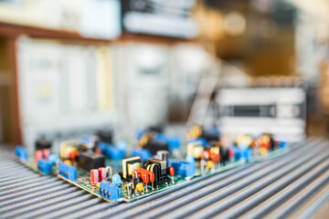 Close-up electric green embedded microcircuits in production