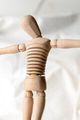 isolated wooden mannequin, mannikin, manikin - standing, photographed from below