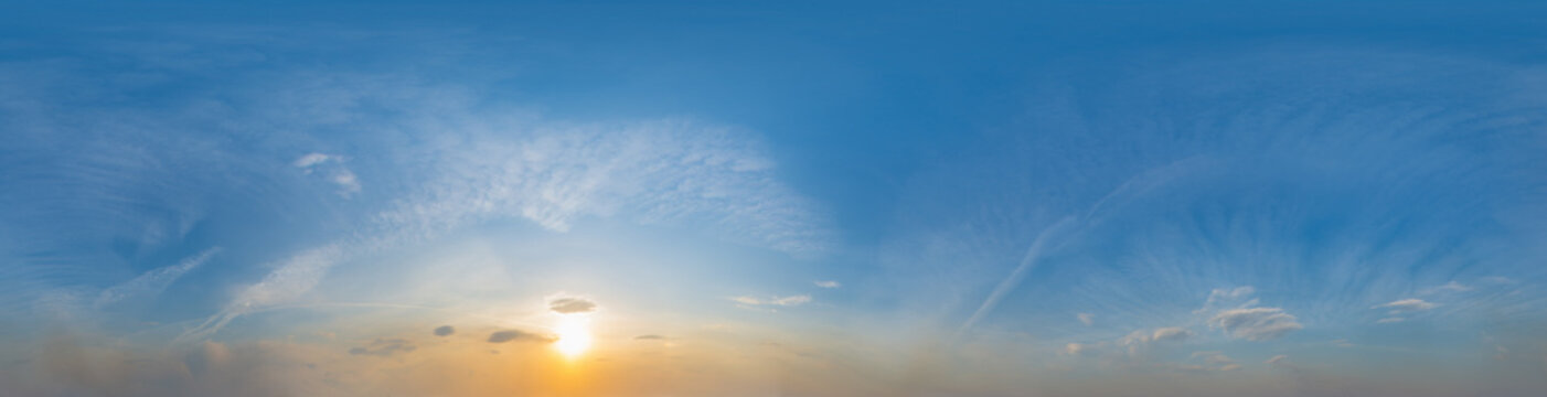 Panorama of beautiful blue sky with clouds at sunset. 180 degree panoramic image.