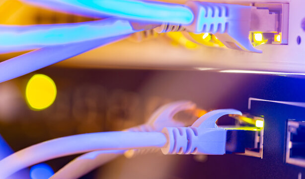 Gigabit connections between routers and switches. 5g technology. Rj45 patchcords. Fast data transfer.