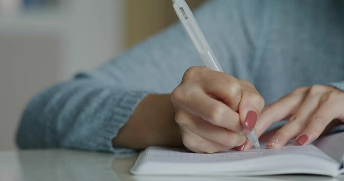 Housewife write on the notebook