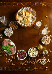 Traditional Middle Eastern food. Lebanese food. Arabian raw kibbeh, olives, cheese, circle, top view, copy space