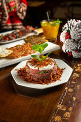 Traditional Middle Eastern food. Lebanese food. Arabian raw lamb meat plate. Christmas decoration