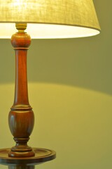 dim lighting room of the mahogany antique lamp. 

This expensive furniture is made in England. 
blurred background soft focus image.	