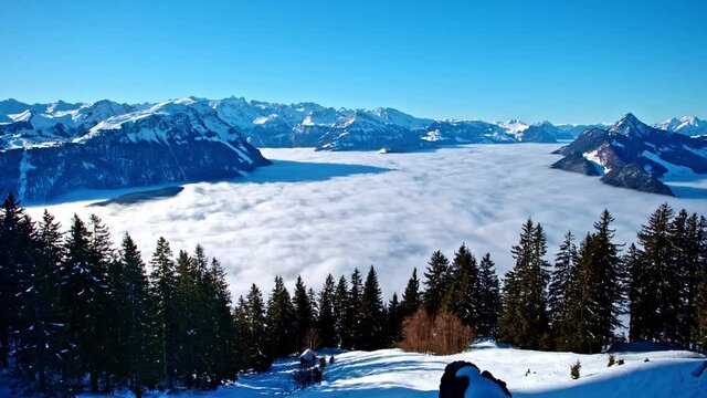 Time lapse of rolling clouds over the top of Grosser Mythen in Switzerland