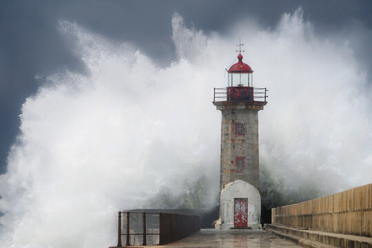 Wave crashing on lighthouse
