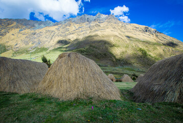 camping huts in a valley in Peru