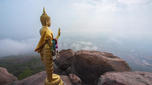 Wat Khao Phra Ya Dern Thong View Point Lopburi Thailand. Timelapse clouds moving fast in during sunrise