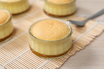 Caramel custard pudding cake in glass bowl