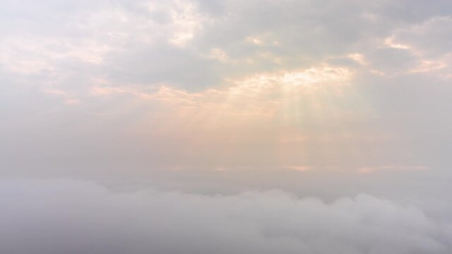 Timelapse clouds moving fast in during sunrise. view of fog flowing from the top of a mountain, Khao Phra Ya Dern Thong View Point Lopburi Thailand