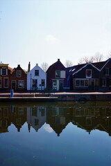 Old houses in the city on Goeree overflakkee Middelharins, characteristic Dutch harbor town with a lot of history and nostalgia.