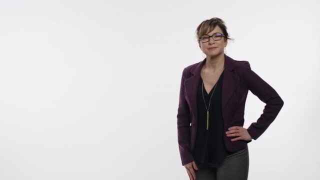 Middle aged businesswoman reacts to a graphic that makes sense