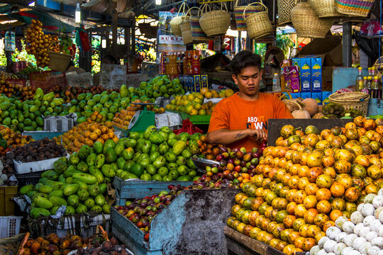 Vegetable and fruit sellers at the Berastagi traditional market, North Sumatra, Indonesia