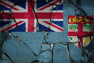National flag of Fiji. depicting in paint colors on an old stone wall. Flag  banner on broken  wall...