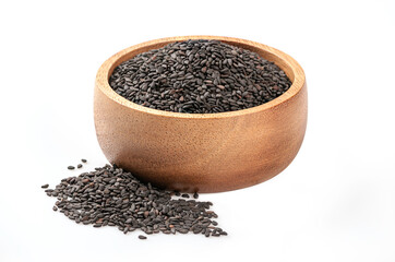 Black sesame seeds in wooden bowl isolated on white background.