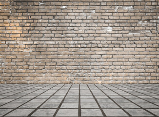 Empty room with bricks wall and tiled floor.