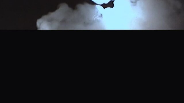 Psychic power. Real VHS video. Analog glitch noise. Occult ritual. Portrait of mystic clairvoyant woman face in smoke cloud motion.