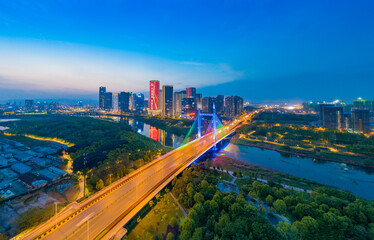 Fototapeta na wymiar City night view of Shangbo Bridge, Yiwu City, Zhejiang Province, China
