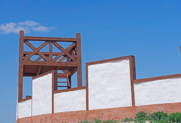antique wooden watchtower against sky