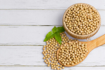 Soybean or soya bean in a bowl on white table background, healthy concept.
