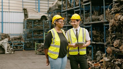 Engineering people are working in heavy industrial plant Engine parts factory ..