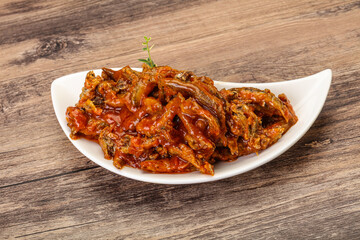 Canned anchovy in tomato sauce