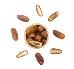 dry dates palm in wooden bowl isolated on white background.